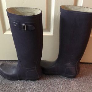 Hunter rain boots.